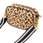 Savanna Chic Cheetah Print Canvas Crossbody Bag with Adjustable Strap" "Interior View of Savanna Chic Cheetah Print Canvas Crossbody Bag Showing Spacious Compartment" "Close-up of Cheetah Print Detail on Savanna Chic Canvas Crossbody Bag